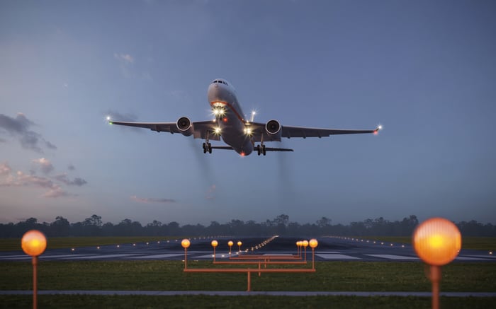 A passenger jet taking off.