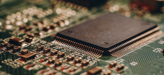A memory chip sits inside a circuit board.
