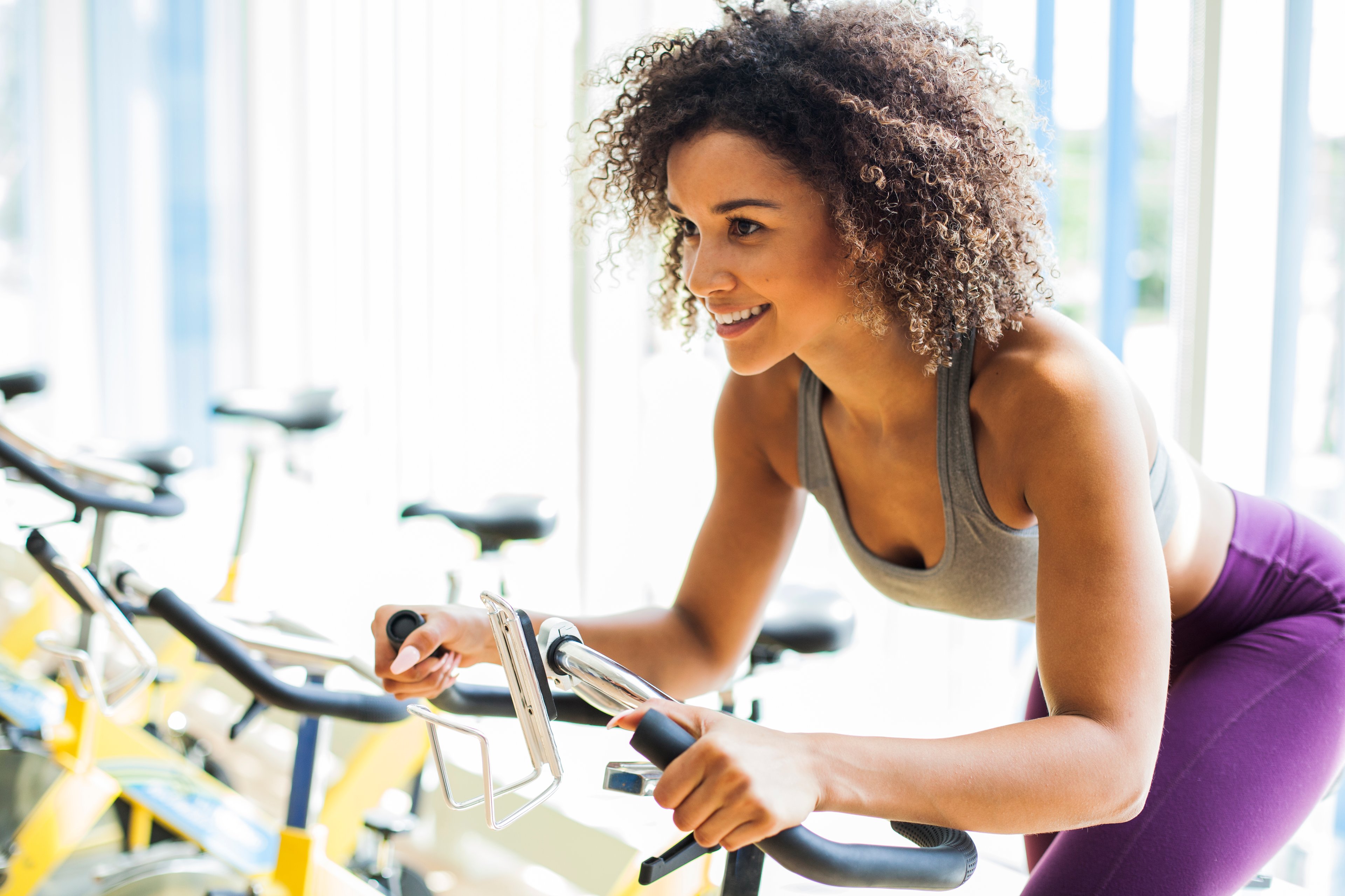 riding an exercise bike