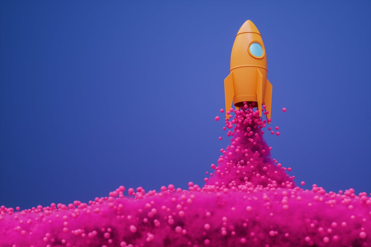 A rocket ship emitting pink spheres, illustrating the stock market rise from artificial intelligence (AI) growth stocks.