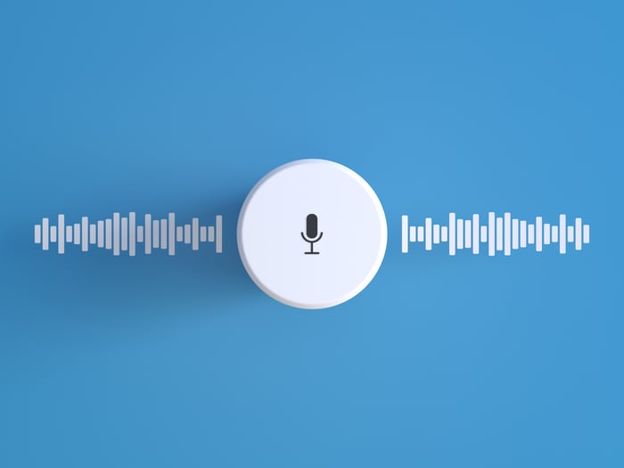Sound waves going out of a circle with a microphone icon in the middle. 