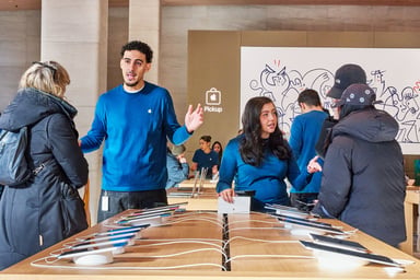 Apple-Sainte-Catherine-Montreal-Canada-opening-day-team-members-assisting-customers