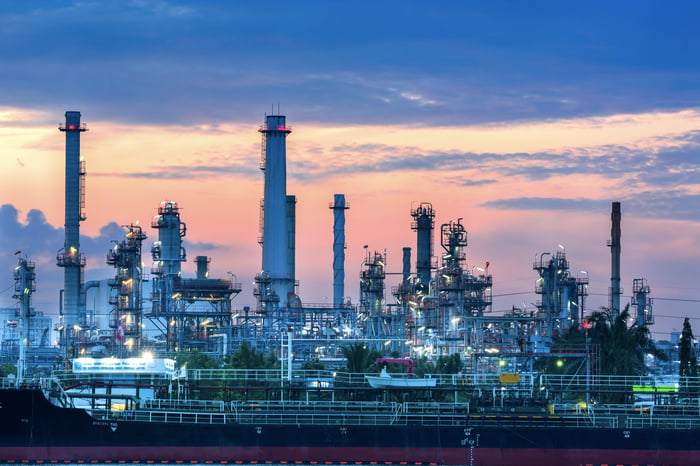 An oil refinery at dawn.