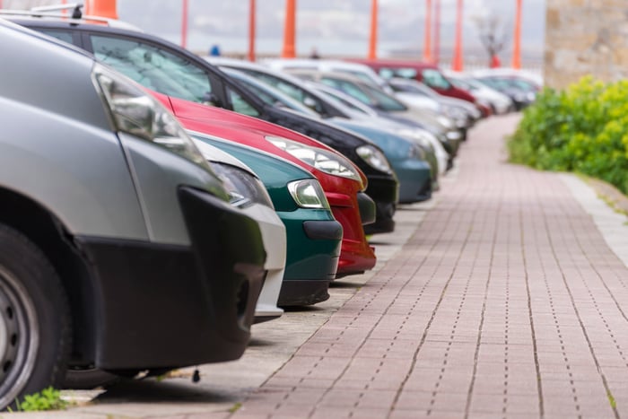 A row of parked cars.