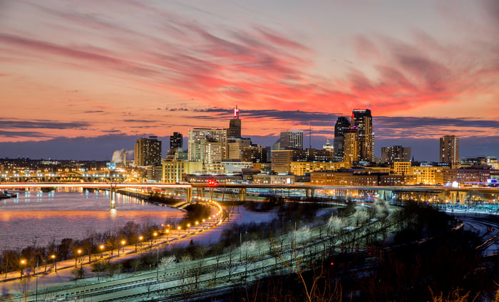 A city's lights at dusk.