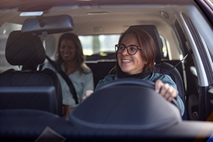 A person driving a car.