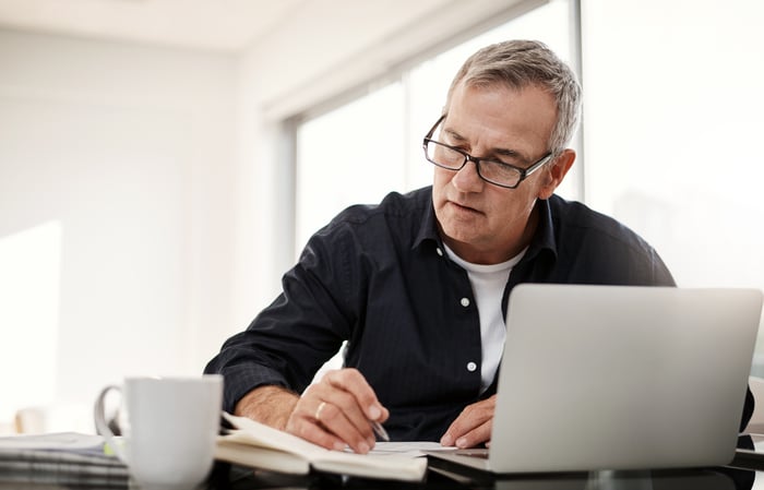 An investor researches the best dividend ETFs.