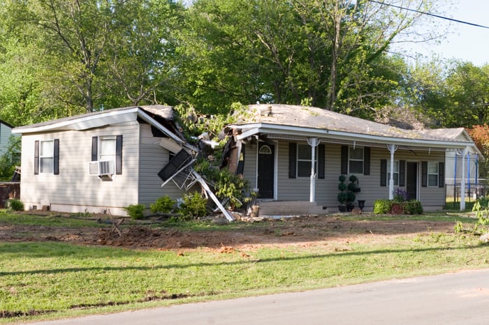 An image of home after a tree fell on the roof.