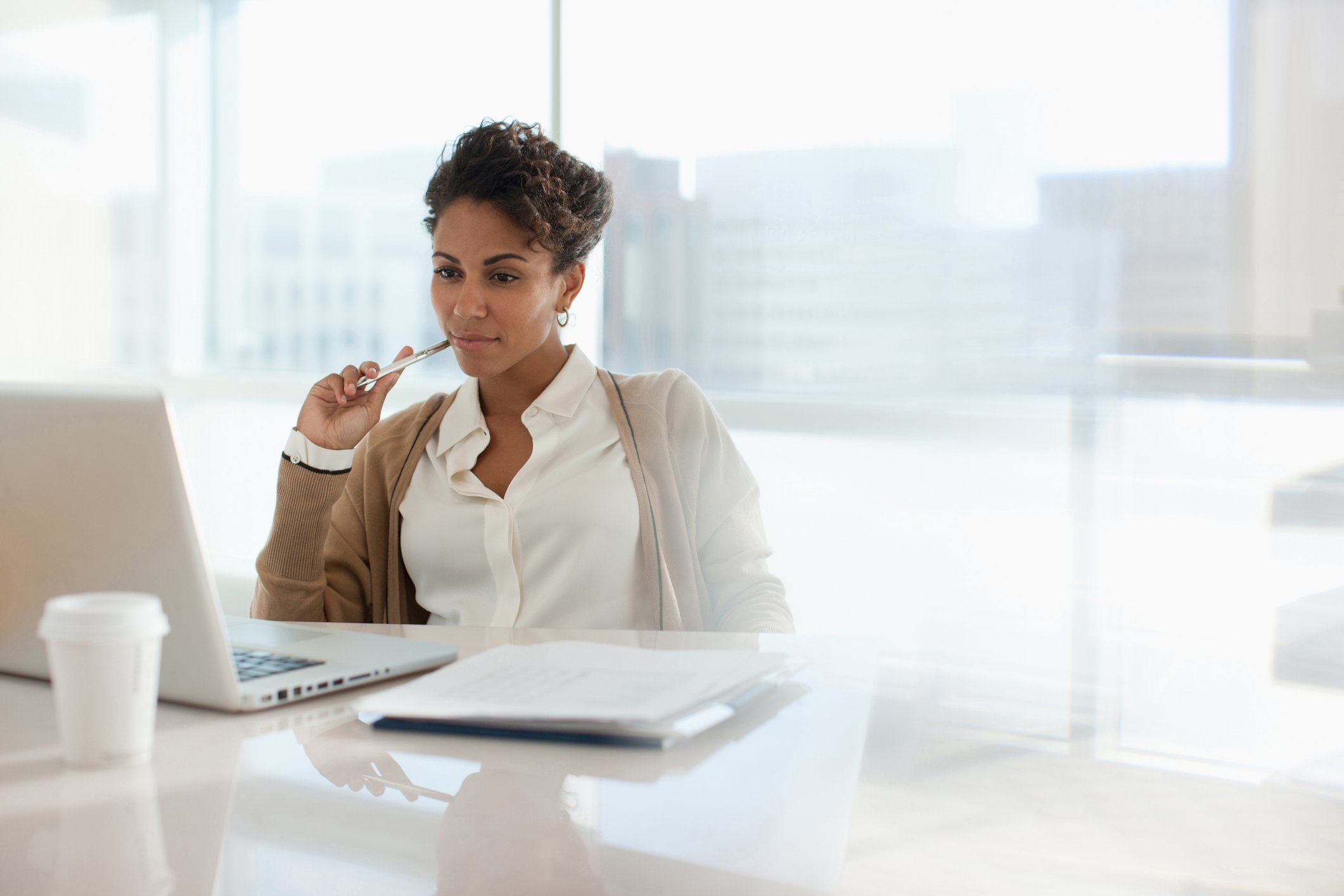 Woman 30s 40s at laptop GettyImages-167890561