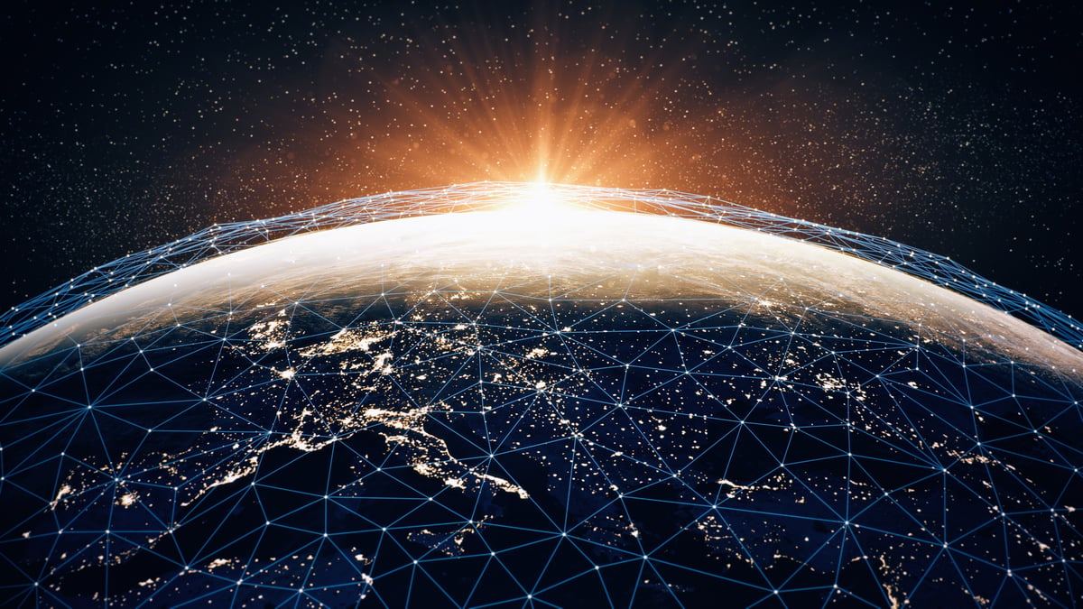 The sun on Earth’s horizon illuminates a grid of connected lines and dots, illustrating the growing importance of low-Earth-orbit broadband and mobile satellites.