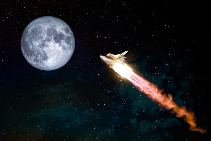 A spaceship arriving at the moon.