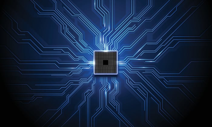 Glowing semiconductor surrounded by blue lines.