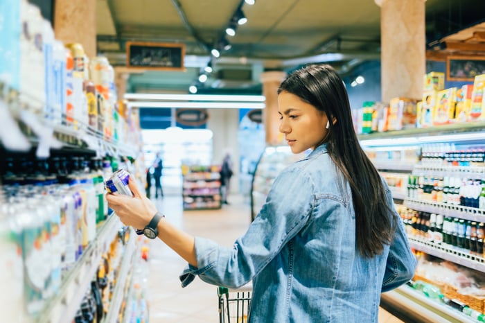 A person is shopping in a grocery store. 