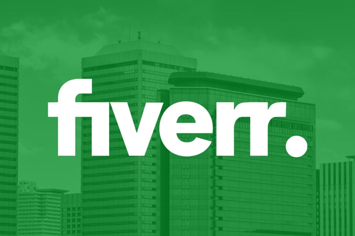 White Fiverr logo on a green background.