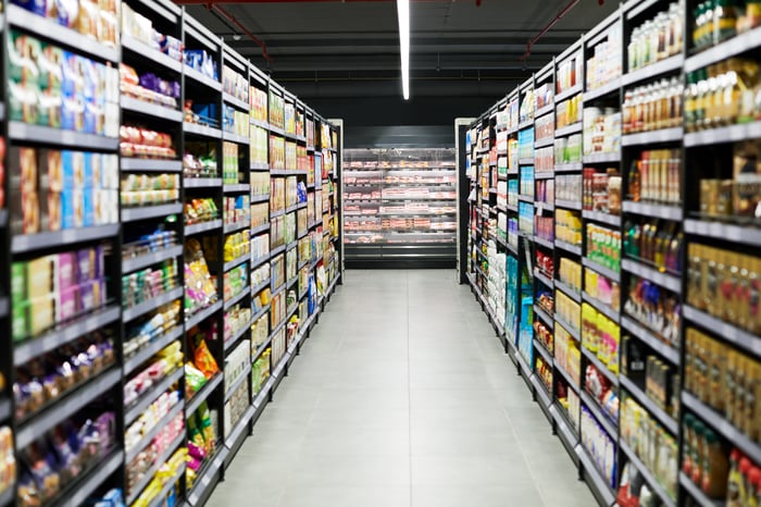 Packages on shelves in a supermarket. 