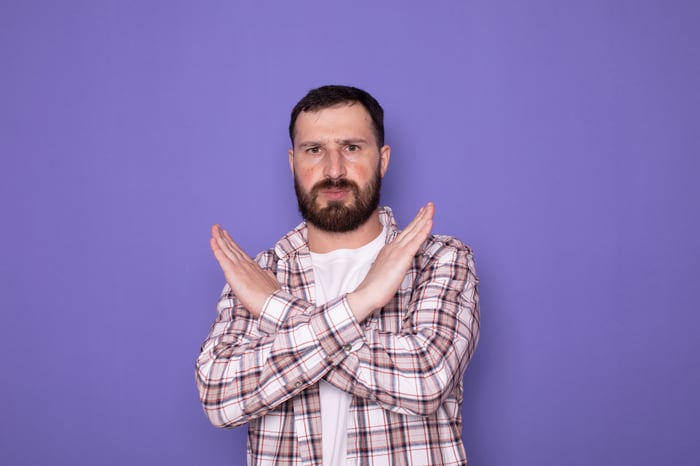 Person with arms crossed.