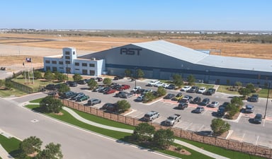 ast spacemobile headquarters hangar building with ast logo from aerial view-ASTS