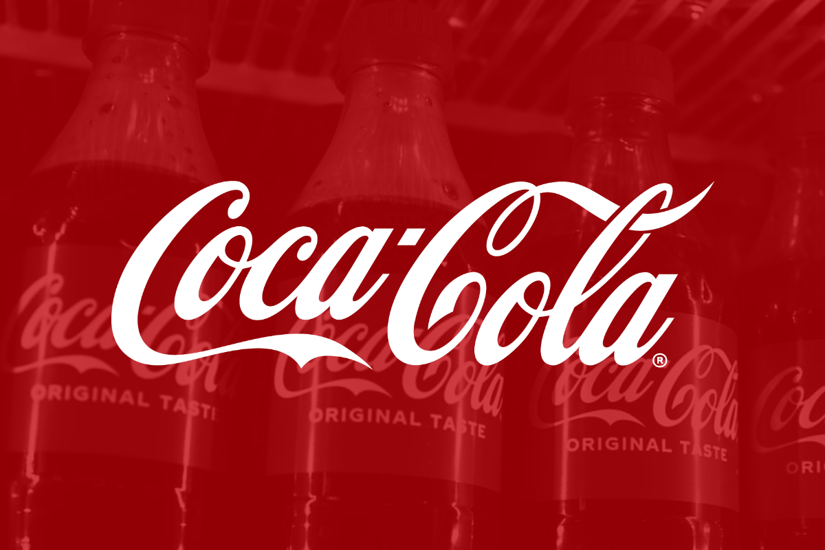 Coca-Cola logo on red filter with bottles in background_ The Motley Fool