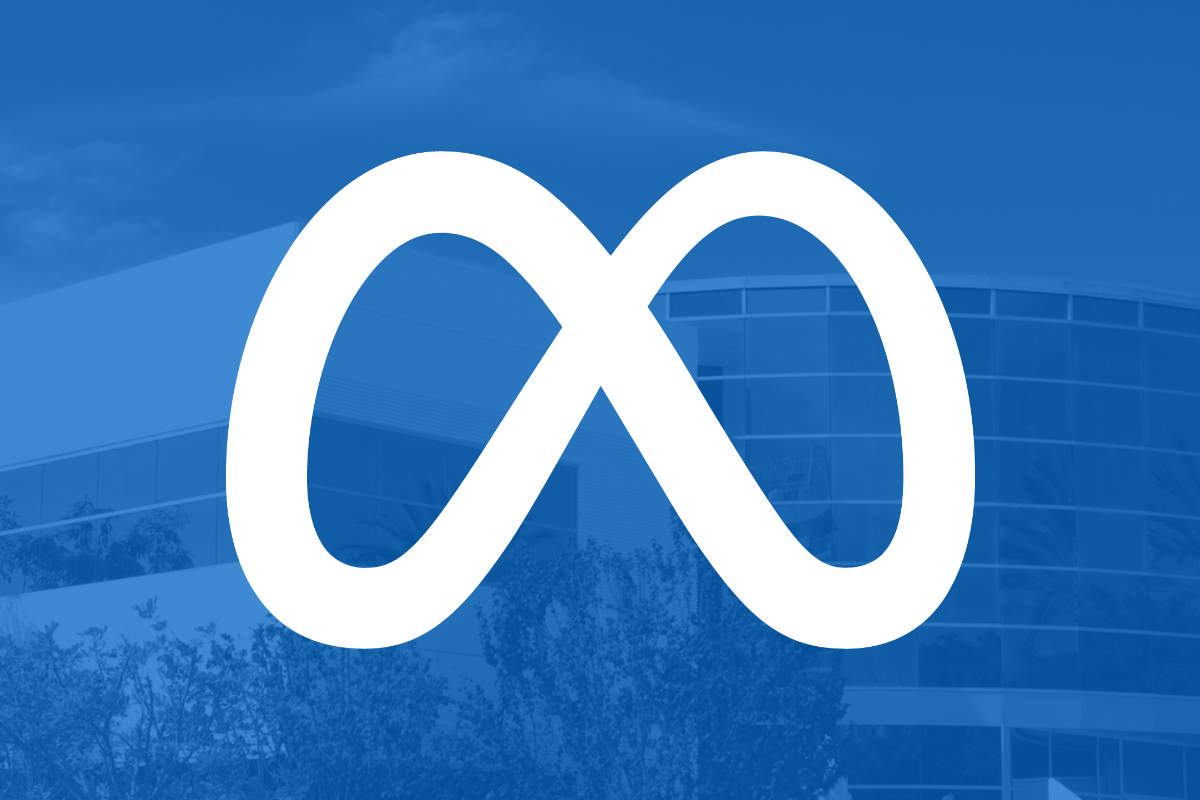 Meta logo on blue filter with office building in background_The Motley Fool