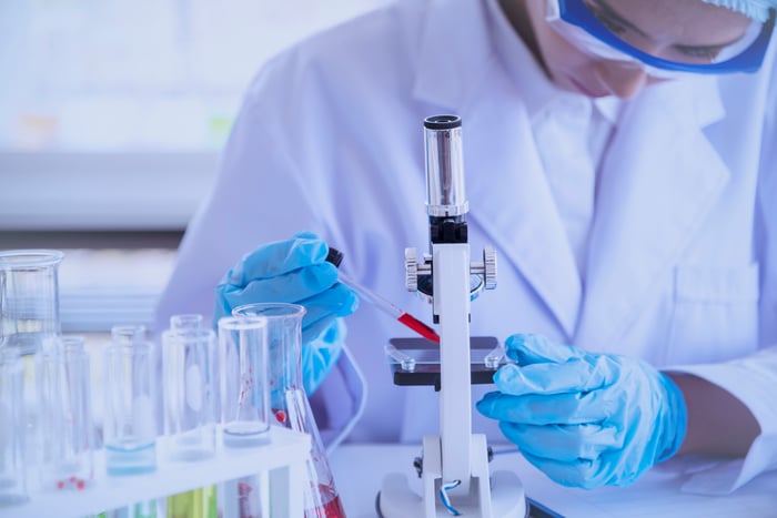 Researchers in a biotech lab.