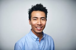 Getty - happy person in blue oxford shirt slight smiling