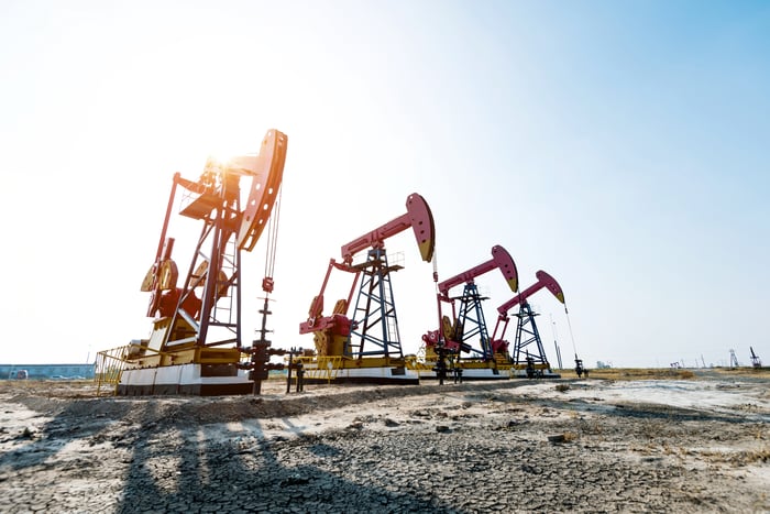 Oil pumpjacks extracting crude oil from the ground.