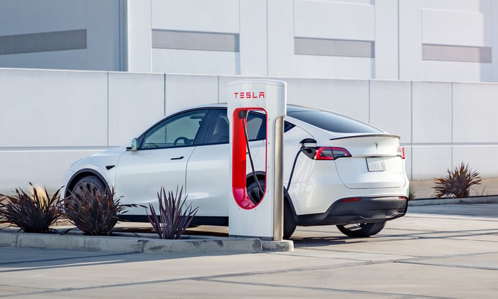 Tesla Model Y at a charging station.