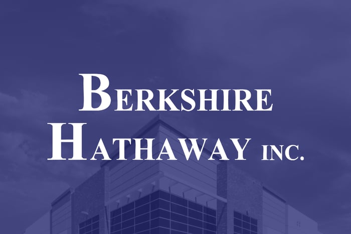 The words Berkshire Hathaway Inc. superimposed over the top of a building. 