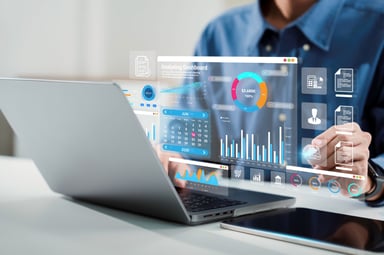 Person using a computer with an overlay of charts.