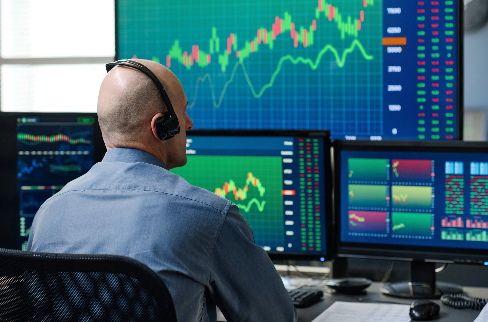 Analyst looking at charts.