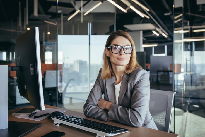 Person working at a computer.