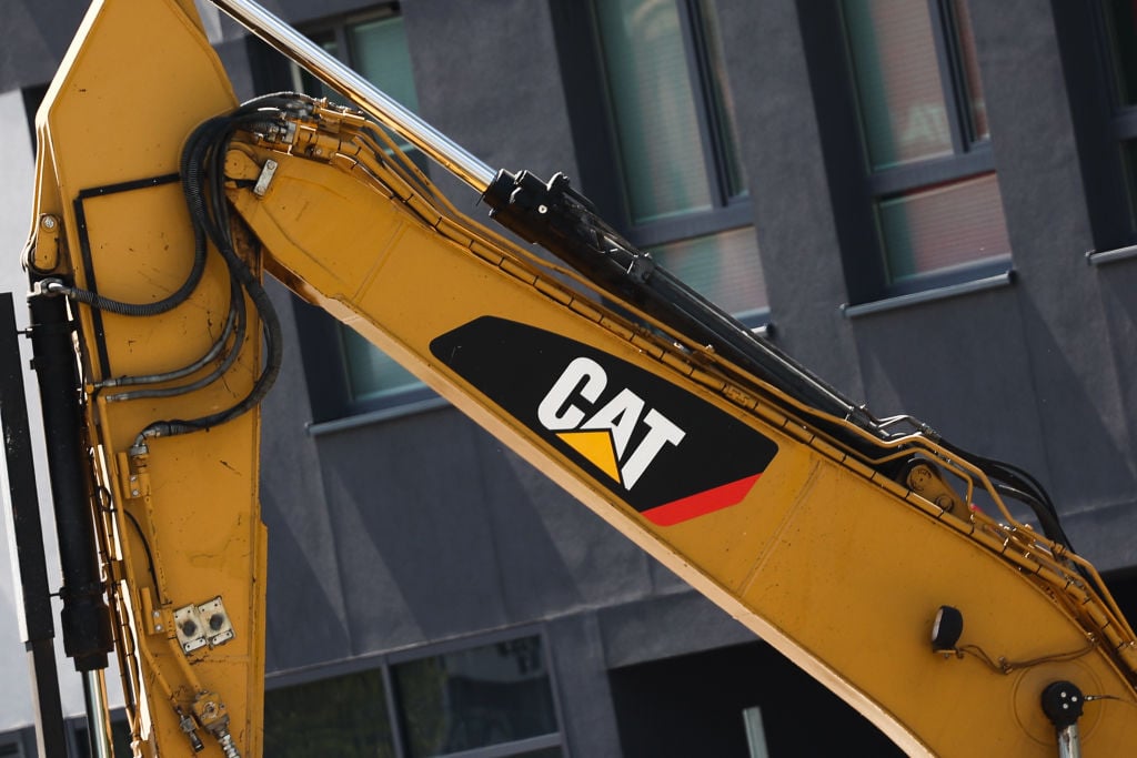 caterpillar-cat-logo-on-excavator-arm-getty