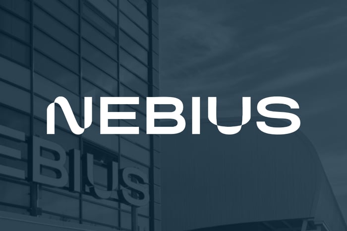 White Nebius logo set over dark shaded view of company data center. 