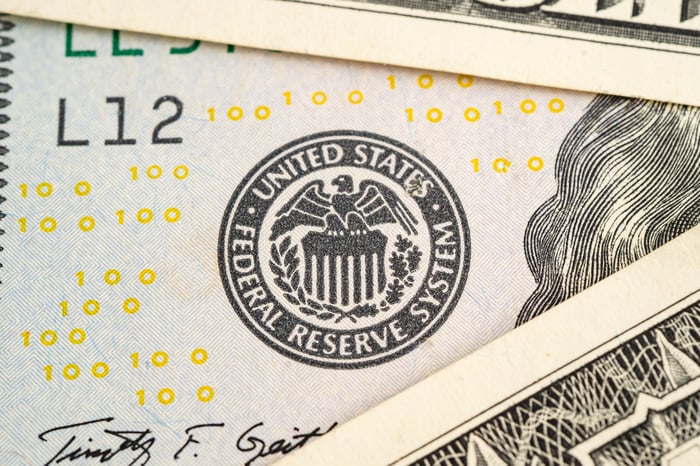 A close-up of the Federal Reserve stamp on cash.