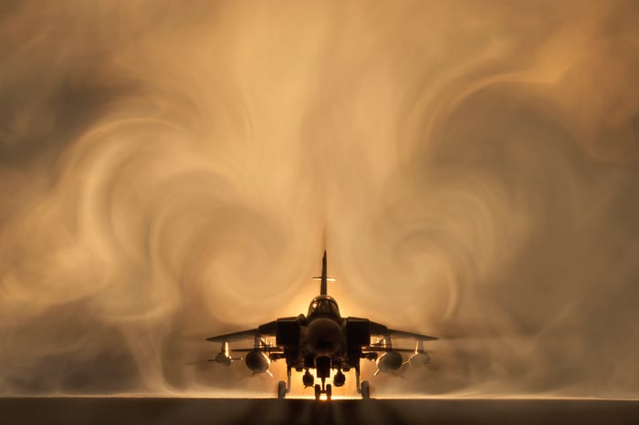 A fighter jet getting ready for takeoff. 