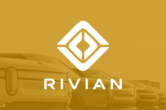 The Rivian logo on a yellow background.