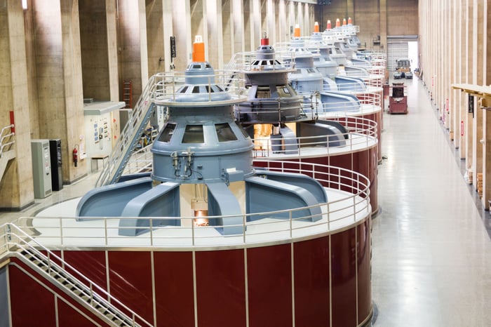 Power turbines at work in a power production plant. 