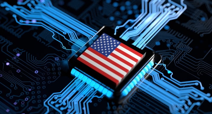 A chip with an American flag on top of it.