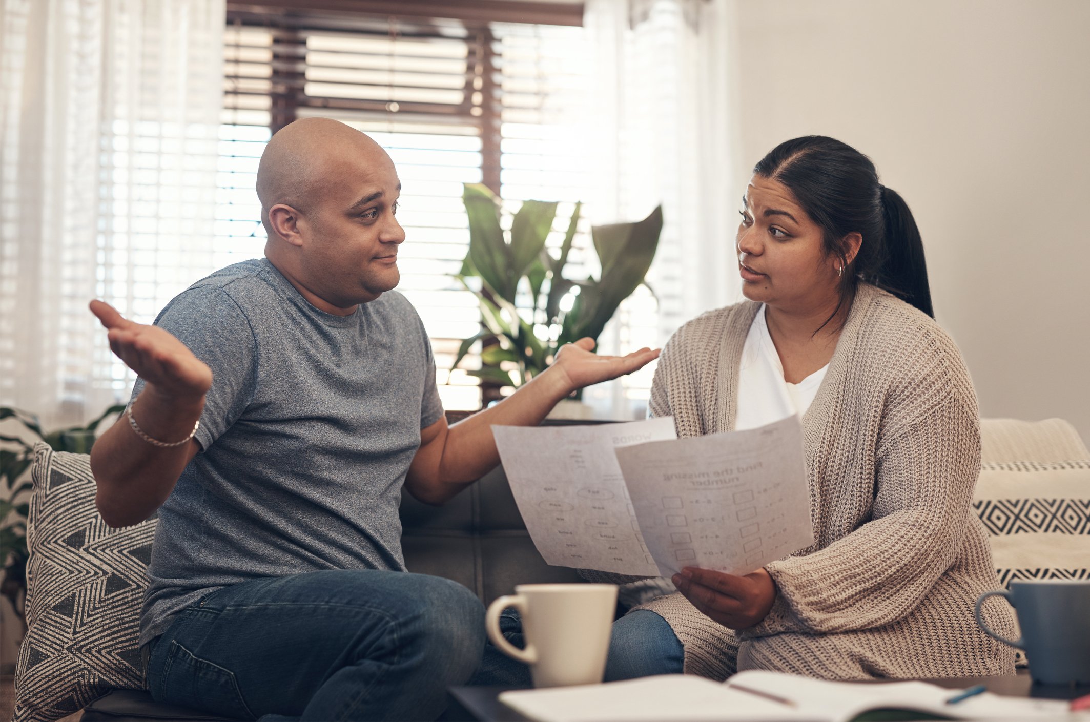 Couple arguing over papers