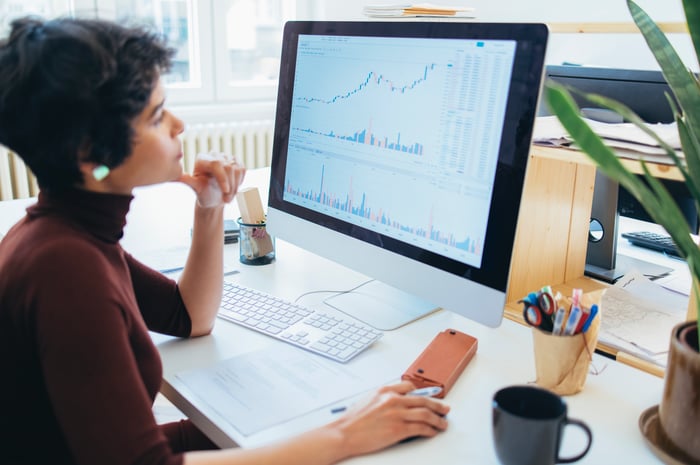 Investor researching stocks. 