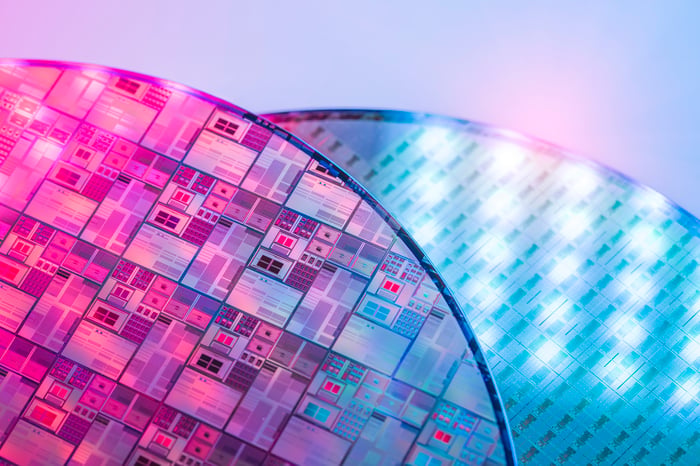 Two uncut silicon wafers.
