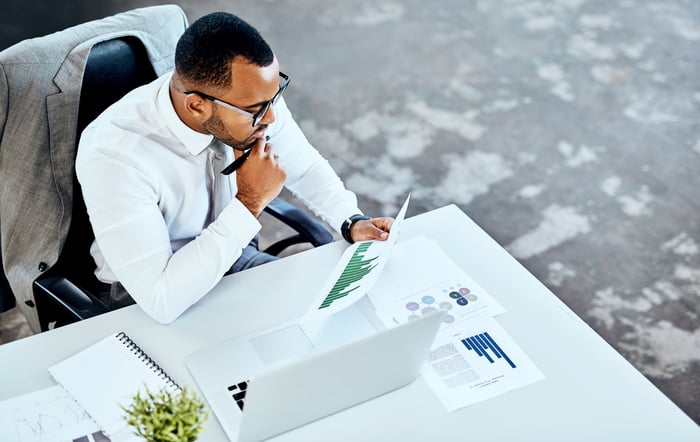 Investor looking at a chart.