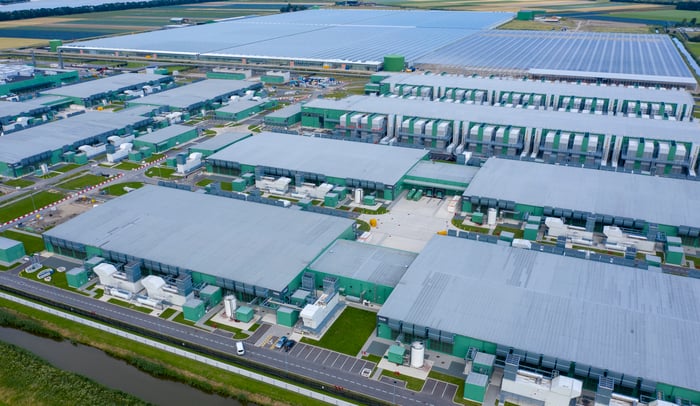 Aerial view of a massive AI data center.