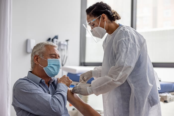 Elderly patient getting vaccinated.