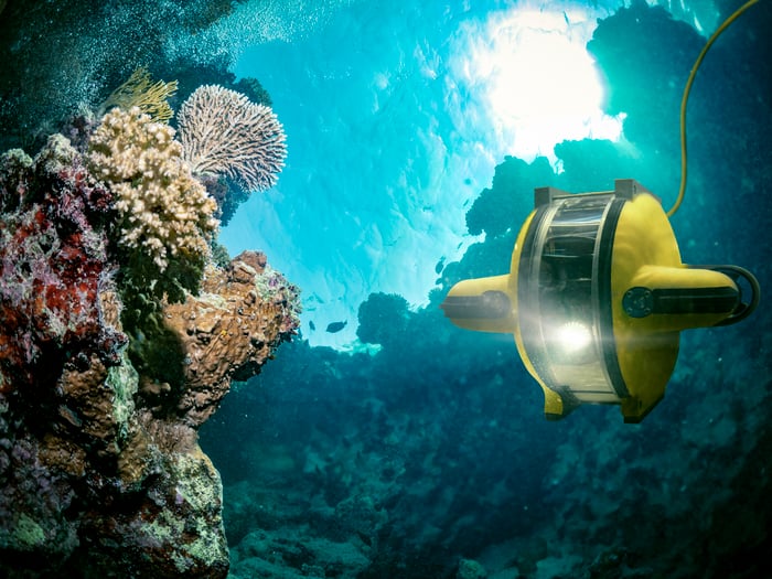 An underwater robot explores the deep ocean.
