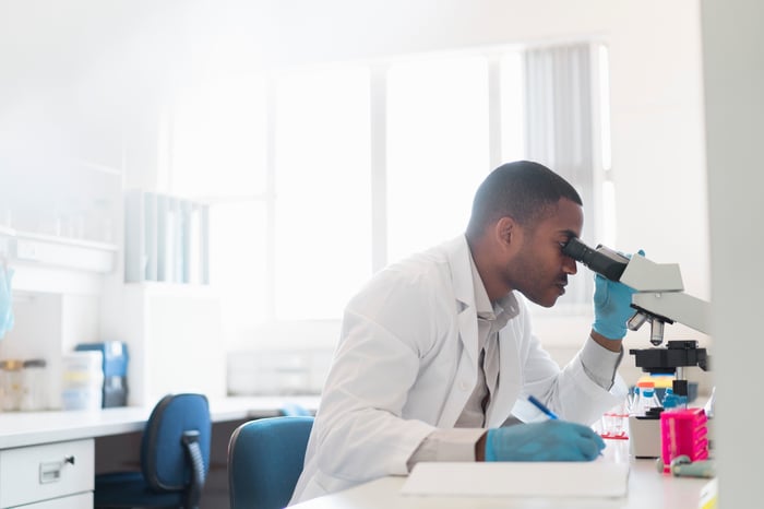 A medical researcher is working in a lab.