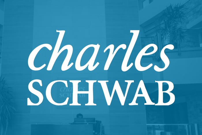 Charles Schwab logo on blue background. 