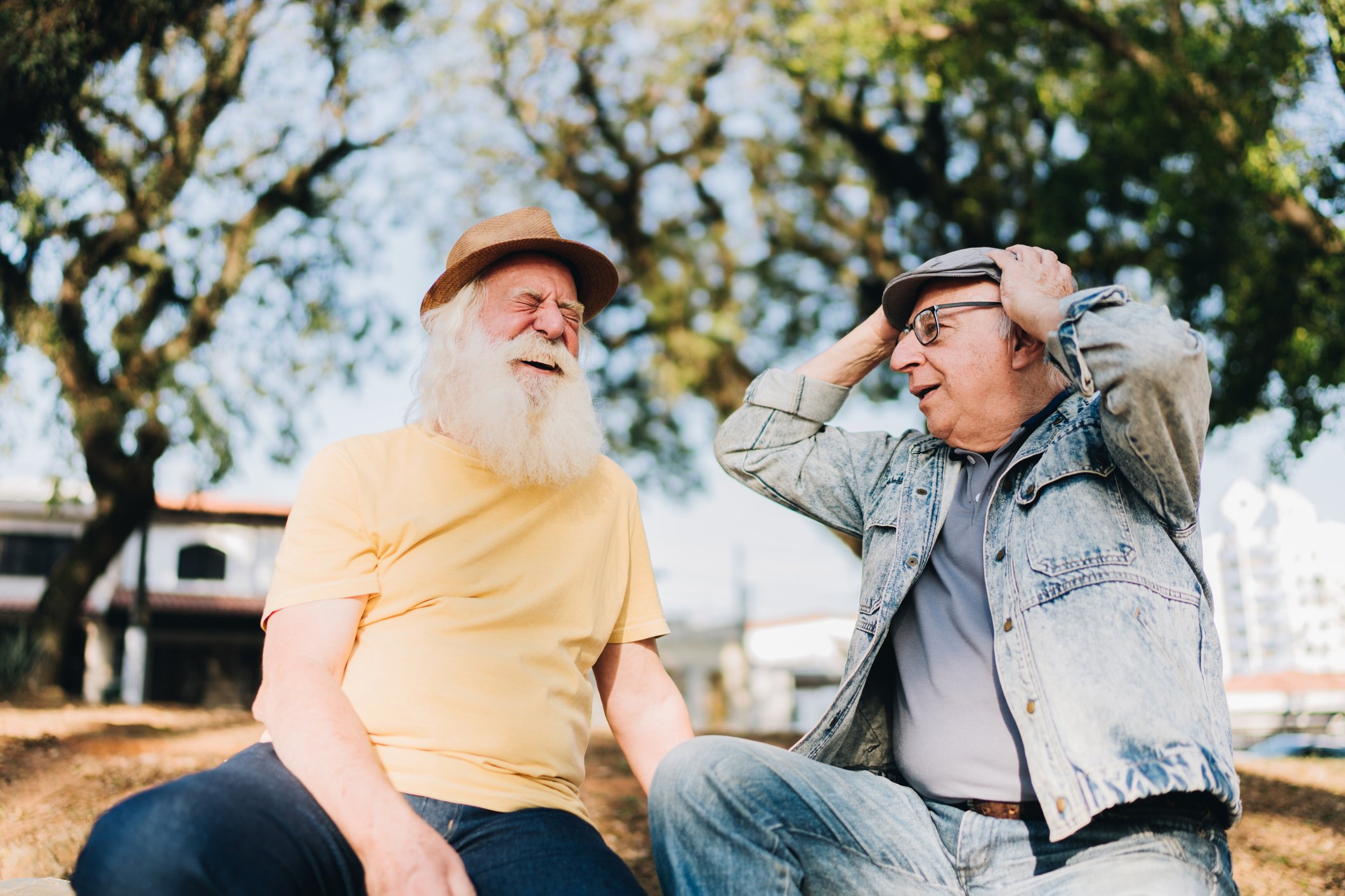 Getty - two older people in a park surprised impressed