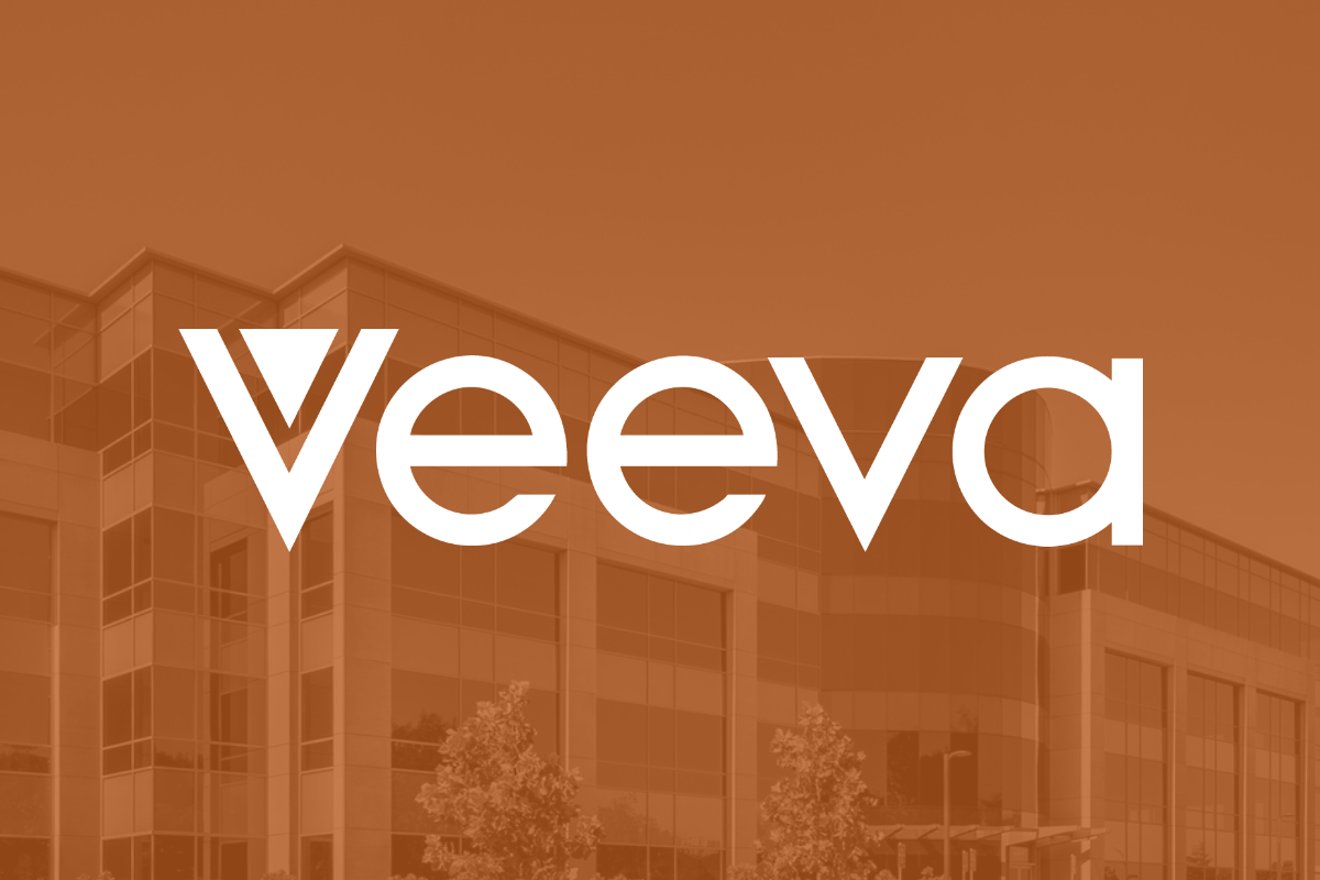The Veeva Systems logo against an orange background superimposed over a picture of the company's headquarters building.