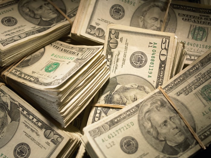 Wads of assorted U.S. currency.